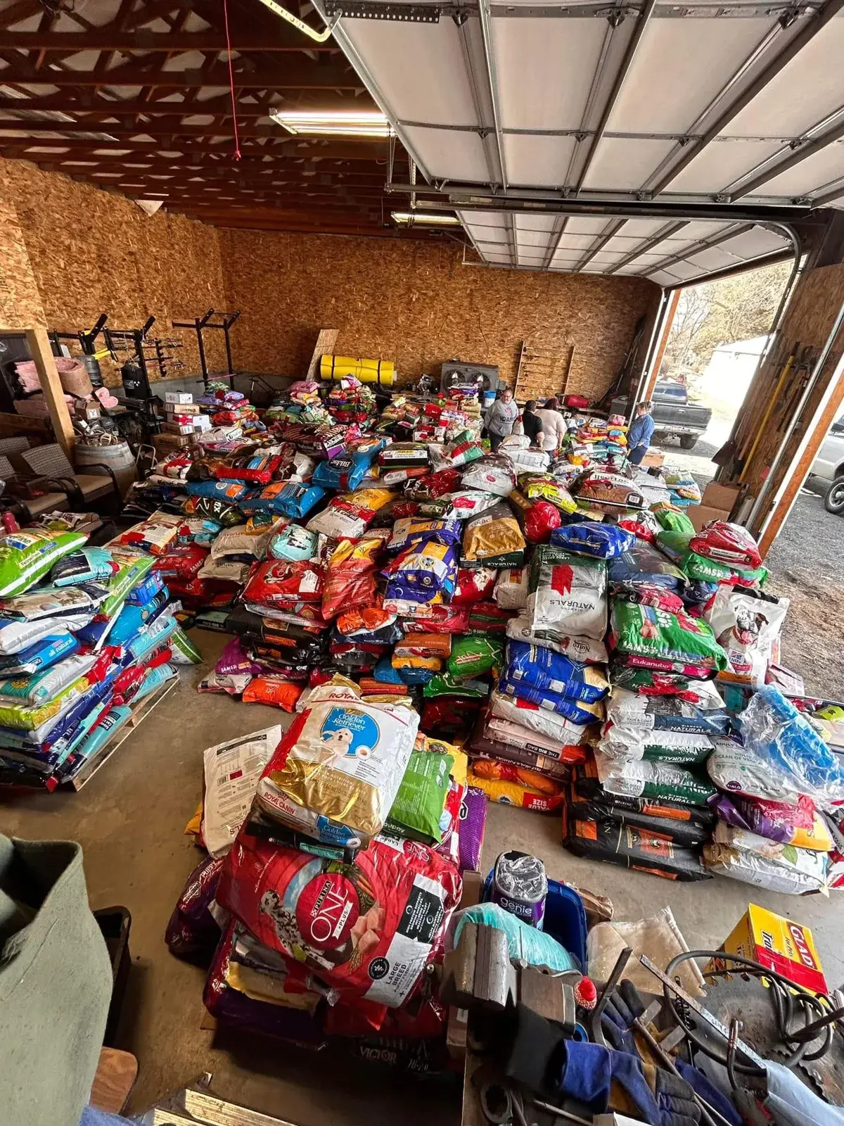 Donated bags of pet food filling the Idaho Animal Rescue Network pantry